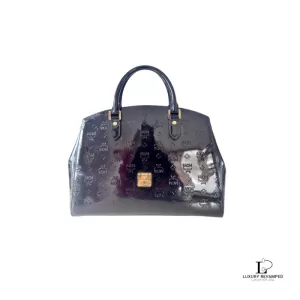Pre-loved MCM black embossed patent leather structured career bag, front view – secondhand designer, NZ