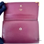 Must de Cartier bordeaux leather medium bifold wallet with gold-tone hardware, view 7