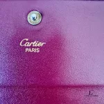 Must de Cartier bordeaux leather medium bifold wallet with gold-tone hardware, view 17