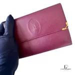 Must de Cartier bordeaux leather medium bifold wallet with gold-tone hardware, view 2
