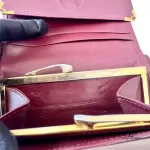 Must de Cartier bordeaux leather medium bifold wallet with gold-tone hardware, view 14
