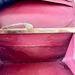 Must de Cartier bordeaux leather medium bifold wallet with gold-tone hardware, view 15