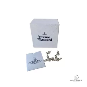 Pre-loved Vivienne Westwood 2D half orb silver earrings with rhinestones, front view – secondhand designer, NZ