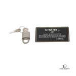 vintage Chanel Old Travel Line black nylon rolling suitcase with padlock and key, view 14