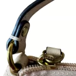 Coach cream leather wristlet mini handbag with gold-tone logo, view 7