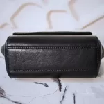 MCM black leather crossbody bag with scale-like flap and gold logo, view 6