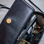 MCM black leather crossbody bag with scale-like flap and gold logo, view 29
