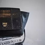 MCM black leather crossbody bag with scale-like flap and gold logo, view 30