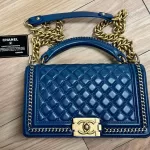 Luxury Revamped - Chanel Blue Quilted Patent Leather Boy Bag – The Reserve Edit – view 2 | authenticated pre-loved luxury