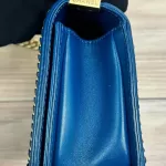 Luxury Revamped - Chanel Blue Quilted Patent Leather Boy Bag – The Reserve Edit – view 5 | authenticated pre-loved luxury