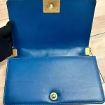 Luxury Revamped - Chanel Blue Quilted Patent Leather Boy Bag – The Reserve Edit – view 7 | authenticated pre-loved luxury