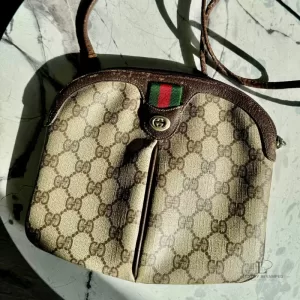 Pre-loved vintage Gucci GG Supreme Sherryline brown crossbody bag, front view – secondhand designer, NZ