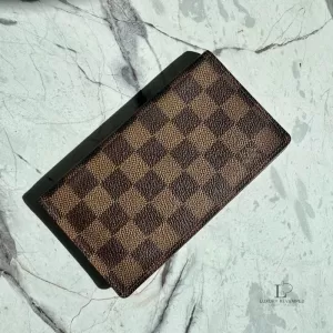 Pre-loved Louis Vuitton Damier Ebene agenda cover bifold wallet, front view – secondhand designer, NZ