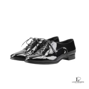 Pre-loved Saint Laurent Paris black patent leather almond-toe oxford dress shoes, size 38, front view – secondhand designer, NZ