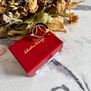 Pre-loved Salvatore Ferragamo gold-tone Gancini scarf ring, front view – secondhand designer, NZ