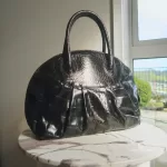 Pre-loved Furla black moc-croc embossed leather Alma-type handbag, front view – secondhand designer, NZ