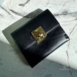 Pre-loved Salvatore Ferragamo Gancini black leather compact wallet, front view – secondhand designer, NZ