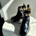 Pre-loved Gucci Trip black patent leather ankle boots with detachable crystal ankle straps, front view – secondhand designer, NZ
