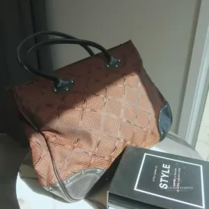 Pre-loved vintage Longchamp Maryvonne brown monogram canvas satchel with black leather trim, front view – secondhand designer, NZ