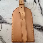 Louis Vuitton Vachetta leather travel accessory set with padlock, luggage tag and poignet, view 8