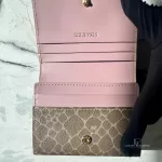 Nina Ricci pink and brown monogram compact wallet, view 7