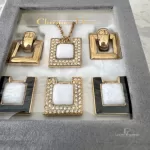 vintage Christian Dior CD interchangeable gold-tone and rhinestone necklace and earrings set, view 7