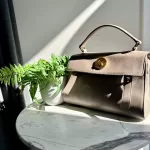 Yves Saint Laurent Muse Two taupe leather two-way handbag, view 37