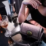 Luxury Revamped - Bottega Veneta Nappa Intrecciato Mirror Lens Shoulder Bag – Handbags Icons – view 29 | authenticated pre-loved luxury