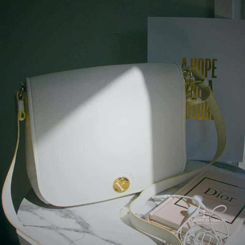 Pre-loved Furla Melody white pebbled leather shoulder bag, front view – secondhand designer, NZ