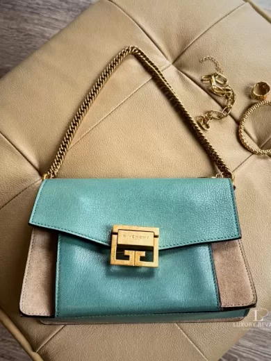 Givenchy GV3 small shoulder bag in light blue goatskin leather and tan suede with gold-tone buckle