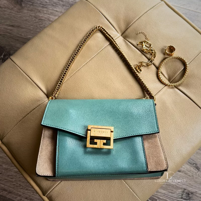 Givenchy GV3 small shoulder bag in light blue goatskin leather and tan suede with gold-tone buckle