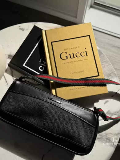 Vintage Gucci black denim pochette with web stripe strap and silver-tone hardware