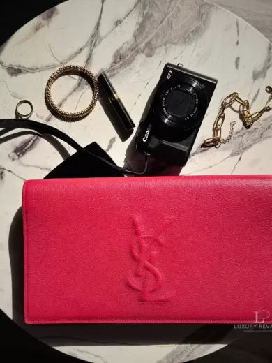 Yves Saint Laurent large Belle de Jour envelope clutch in lipstick fuchsia calfskin leather